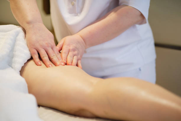 Therapist is doing some Manual Lymphatic massage